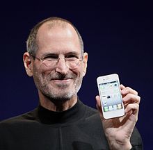 Steve Jobs with the iPhone 4 (https://en.wikipedia.org/wiki/Steve_Jobs ())